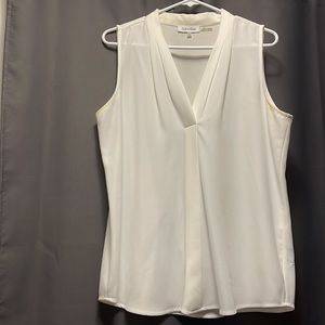 Calvin Klein sleeveless blouse.